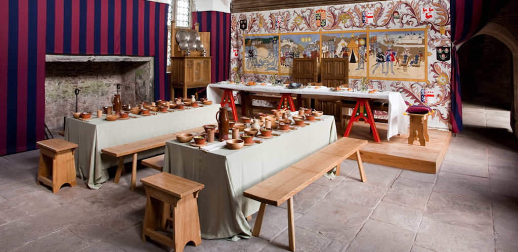 The Great Hall at Tretower Court, set for a dinner in c.1465