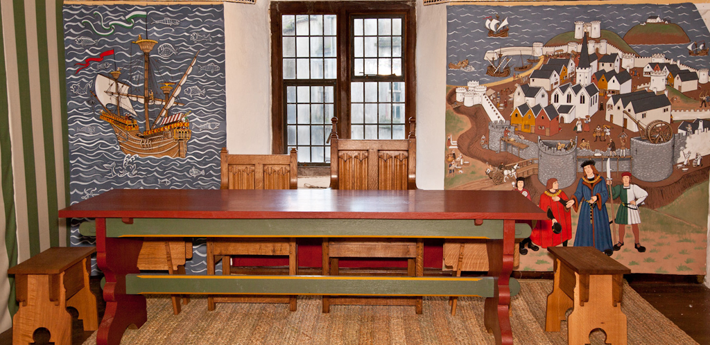 The High Table at Tenby’s Tudor Merchant’s House, c.1500, showing painted cloths and hangings